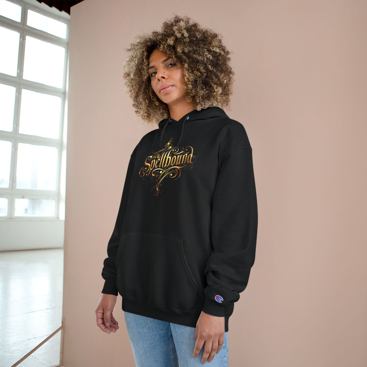 Spellbound Unisex Champion Hoodie – Fantasy Gold Lettering